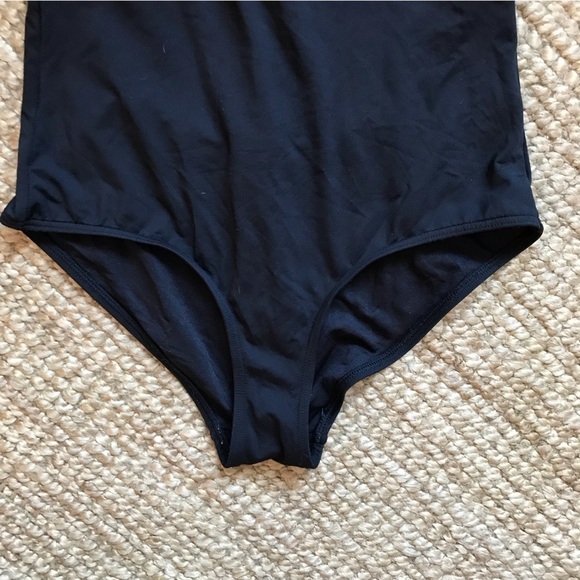 NIP tuck black one piece swim suit.  Size 6/8. - Picture 6 of 11